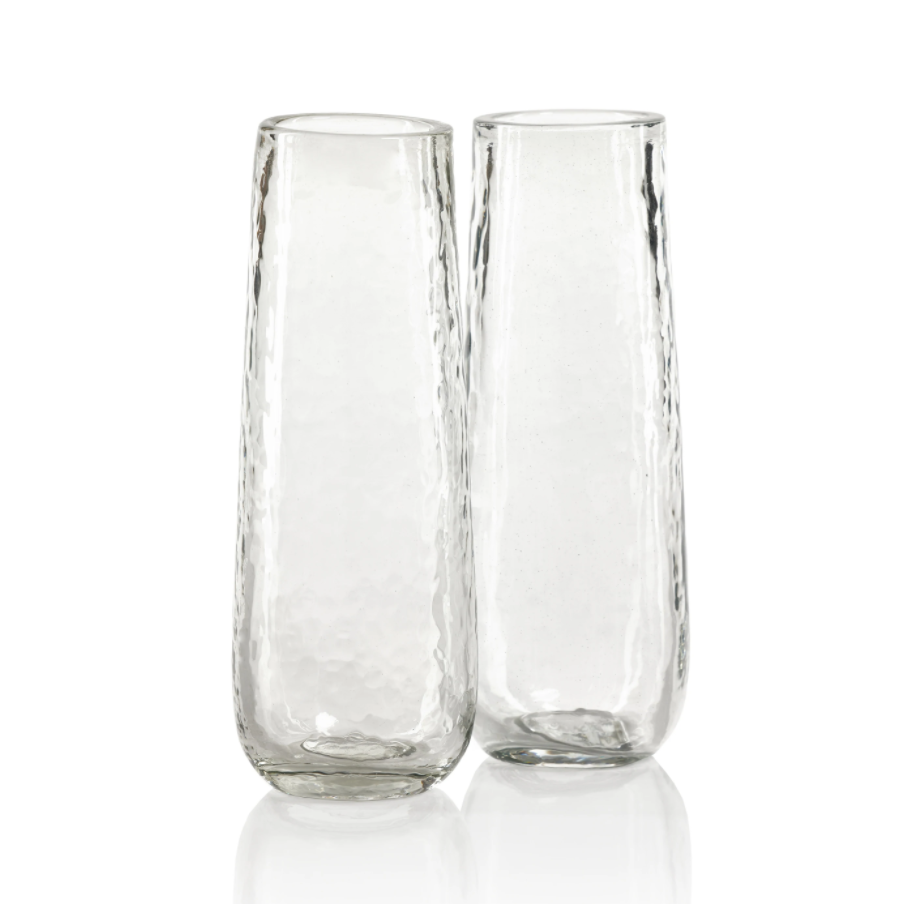 https://www.bluehandhome.com/cdn/shop/products/Artisan-Hammered-Stemless-Champagne-Flute_1200x.png?v=1675718960